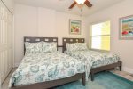 2nd bedroom with 2 comfortable full beds